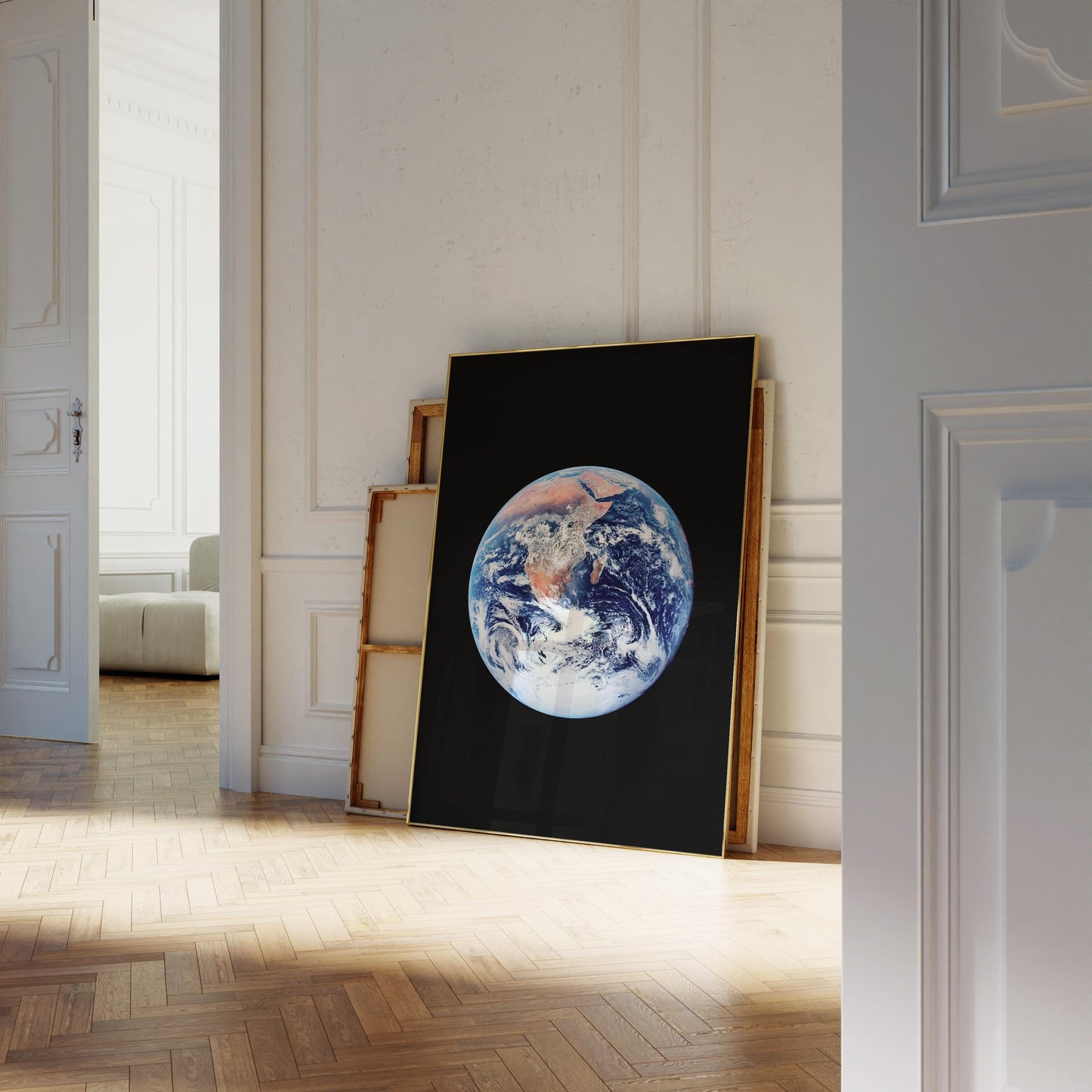 a large, framed painting of the Earth, depicting the planet in a detailed and colorful manner.