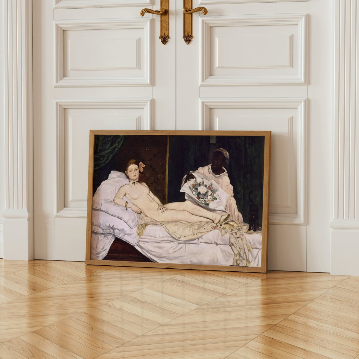 The image is a framed painting depicting a nude woman lying on a bed, with a woman holding a bouquet of flowers next to her.